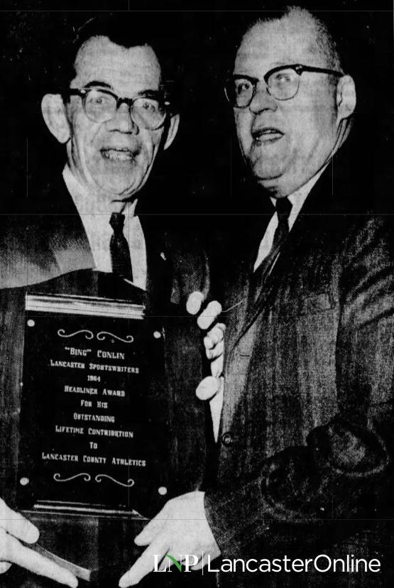 Bing Conlin receiving award
